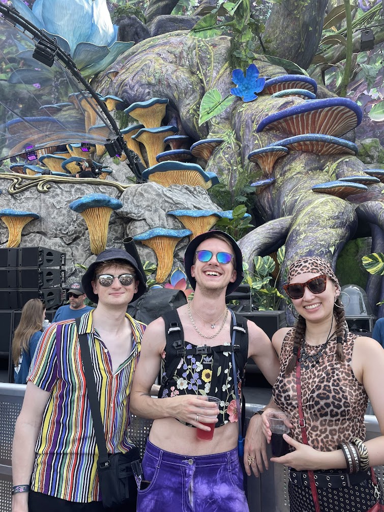 Lloyd with friends at a festival stage